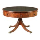 A LARGE GEORGE IV FLAMED MAHOGANY DRUM TABLE