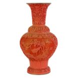 AN EARLY 20TH CENTURY CHINESE CINNABAR VASE