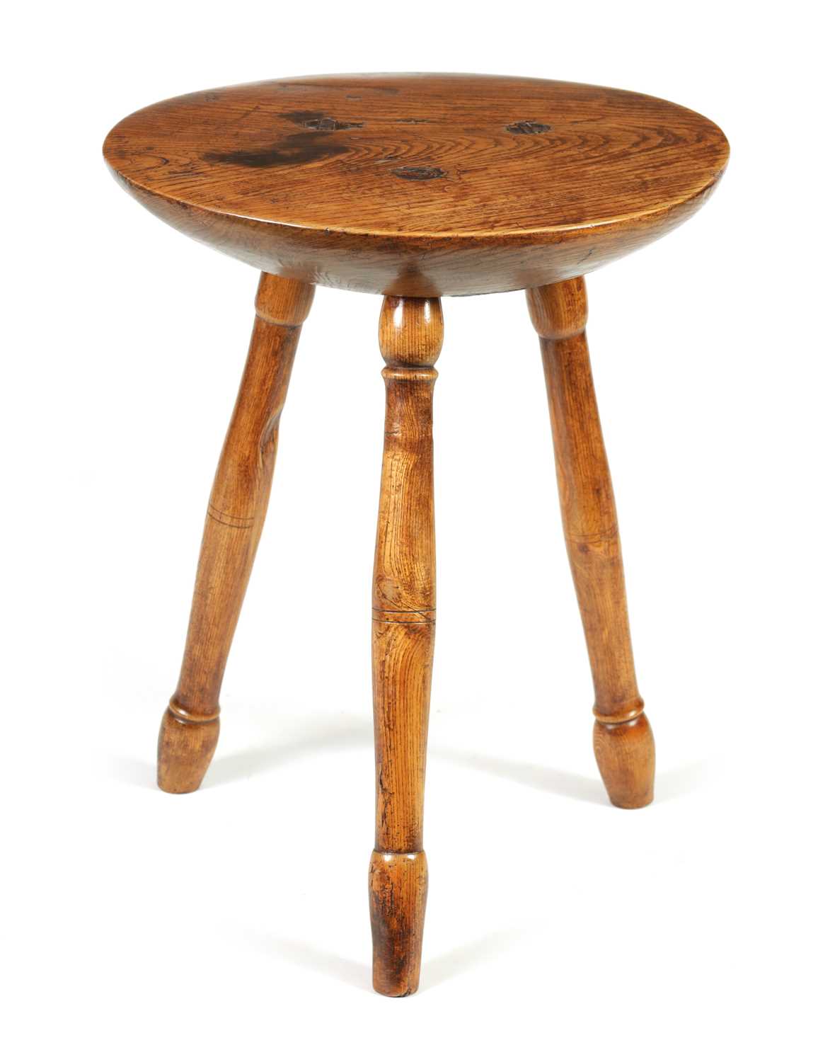 A GOOD GEORGE III ELM CHEESE TOP CRICKET TABLE