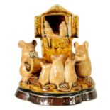 A DOULTON LAMBETH TWO-TONE SHADED BROWN SALT GLAZED 'PLAY GOERS' GROUP OF MICE BY GEORGE TINWORTH CI