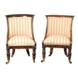 A PAIR OF REGENCY SIMULATED ROSEWOOD UPHOLSTERED LIBRARY CHAIRS