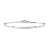 A 14CT WHITE GOLD BAGUETTE CUT DIAMOND BRACELET