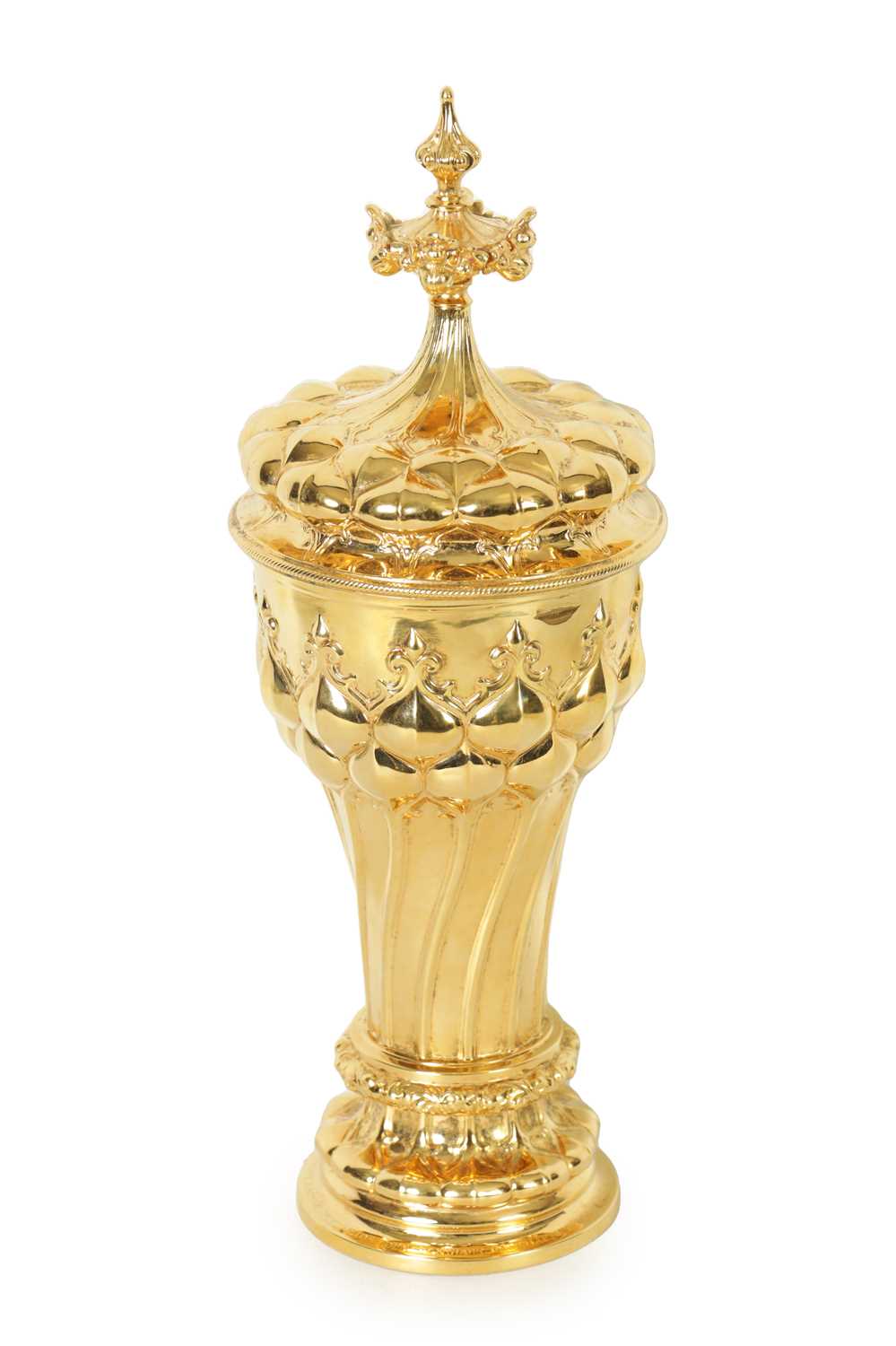 AN ART DECO GOTHIC REVIVAL CONTINENTAL SILVER GILT PRESENTATION CUP AND COVER