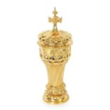 AN ART DECO GOTHIC REVIVAL CONTINENTAL SILVER GILT PRESENTATION CUP AND COVER