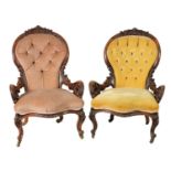 A PAIR OF VICTORIAN CARVED WALNUT DRAWING ROOM BUTTON-UPHOLSTERED CHAIRS