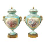 A PAIR OF LATE 19TH CENTURY FRENCH ORMOLU MOUNTED SEVRES PATTERN VASES AND COVERS