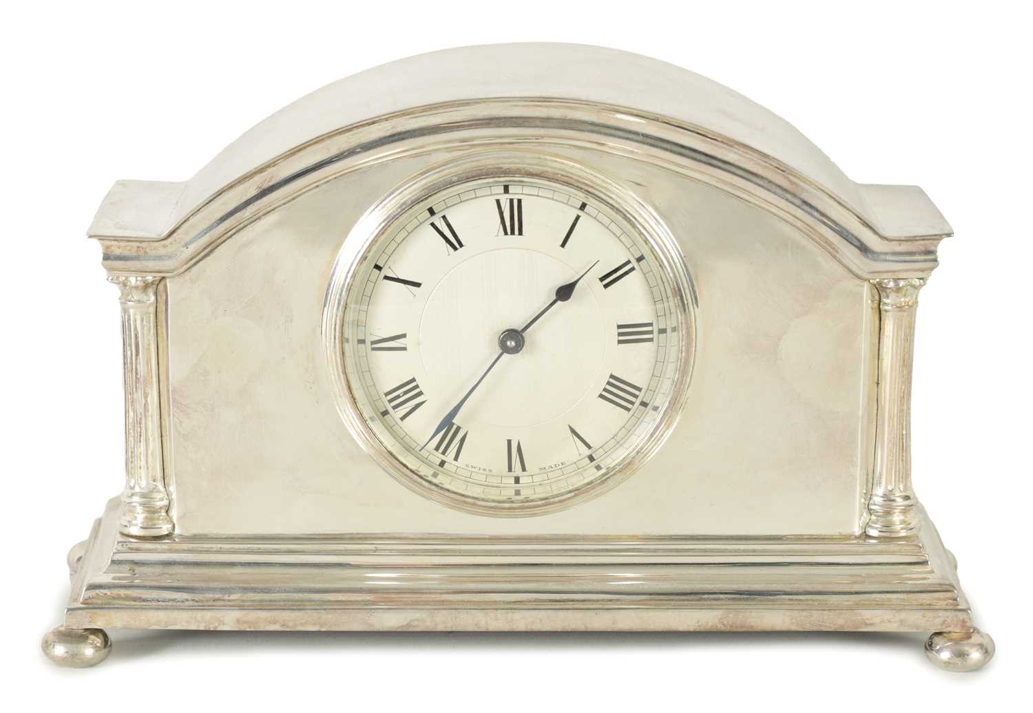 AN EDWARDIAN SILVER-PLATED TIMEPIECE MANTEL CLOCK