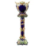 A 19TH CENTURY CONTINENTAL MAJOLICA PEDESTAL JARDINIERE