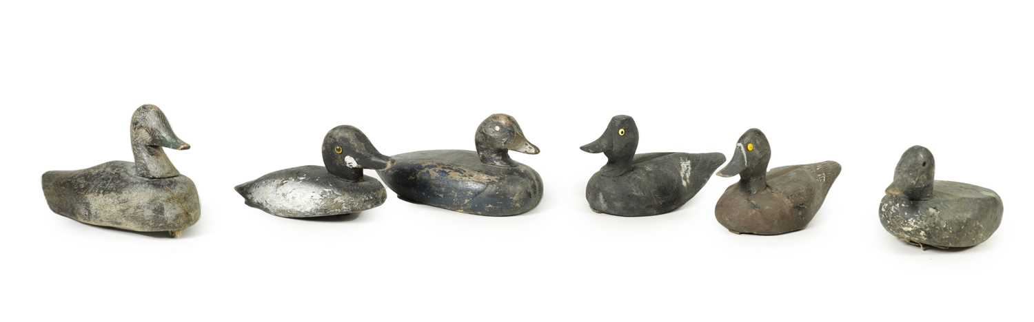 A COLLECTION OF SIX 19TH CENTURY PAINTED CARVED WOODEN DECOY DUCKS