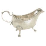 A GEORGE III IRISH SILVER SAUCE BOAT