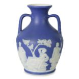 A WEDGWOOD DARK BLUE JASPER WARE MODEL OF THE PORTLAND VASE CIRCA 1900