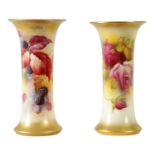 TWO EARLY 20TH CENTURY ROYAL WORCESTER SPILL VASES DECORATED IN AUTUMN BERRIES SIGNED KITTY BLAKE AN