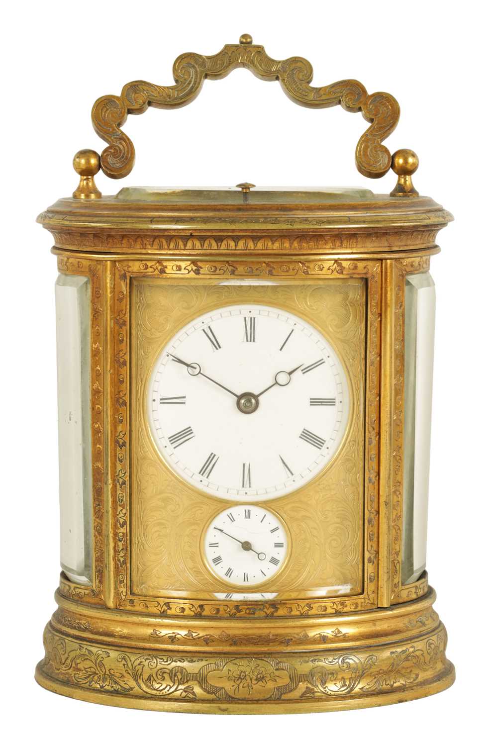 A LATE 19TH CENTURY OVAL ENGRAVED GILT BRASS CARRIAGE CLOCK REPEATER