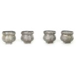 A SET OF 4 19TH CENTURY INDIAN SILVER POST VASES