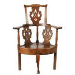AN EARLY 18TH CENTURY COUNTRY OAK CORNER CHAIR