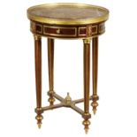 A 20TH CENTURY FRENCH GILT BRASS MOUNTED MAHOGANY CIRCULAR OCCASIONAL TABLE