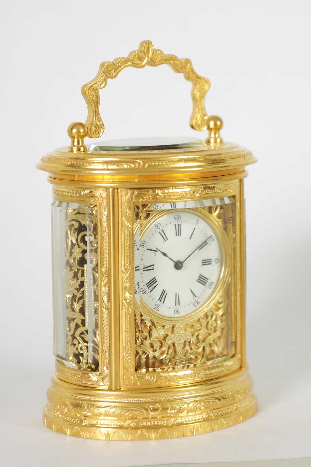 A LATE 19TH CENTURY FRENCH MINIATURE ENGRAVED OVAL CARRIAGE CLOCK - Image 2 of 9