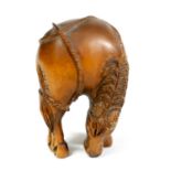 AN ORIENTAL BOXWOOD NETSUKE OF A HORSE