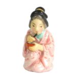 JAPANESE GIRL. A RARE ROYAL WORCESTER CANDLE EXTINGUISHER