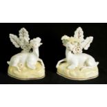 A PAIR OF EARLY 19TH CENTURY PORCELANEOUS STAFFORDSHIRE ANIMAL FIGURES