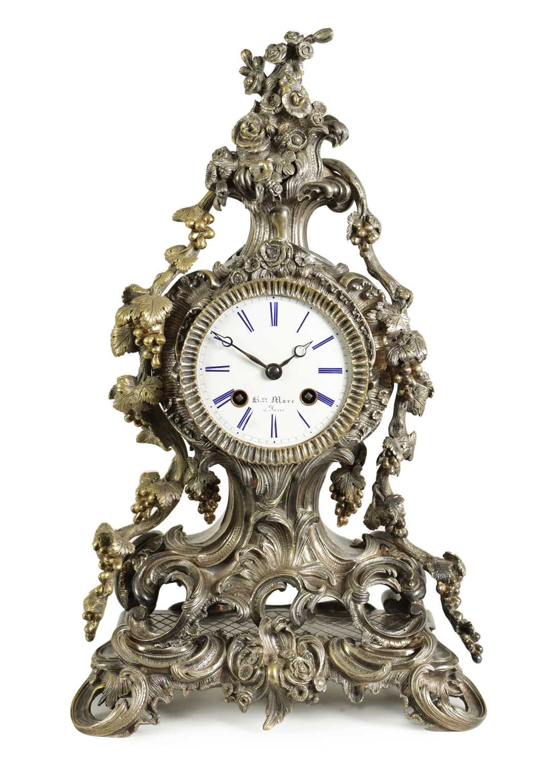 HENRY MARC, A PARIS. A MID 19TH CENTURY FRENCH ROCOCO STYLE SILVERED BRONZE MANTEL CLOCK