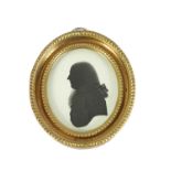 HOUGHTON AND BRUCE-AN EARLY 19TH CENTURY OVAL SILHOUETTE BUST PORTRAIT ON PLASTER
