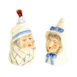 TWO ROYAL WORCESTER “MR AND MRS CAUDLE” CANDLE EXTINGUISHERS