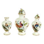 A MATCHED GARNITURE OF THREE LATE 19TH CENTURY AUGUSTUS REX VASES