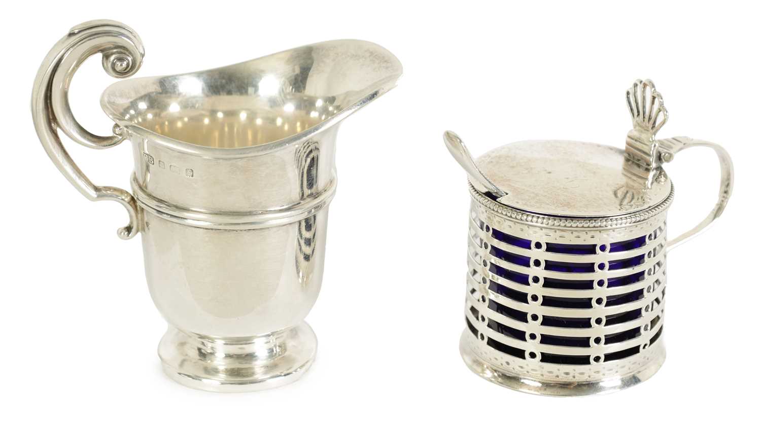 A GEORGE III SILVER MUSTARD POT WITH BLUE GLASS LINER