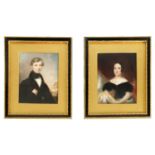 A PAIR OF 19TH CENTURY HALF LENGTH PORTRAITS ON IVORY
