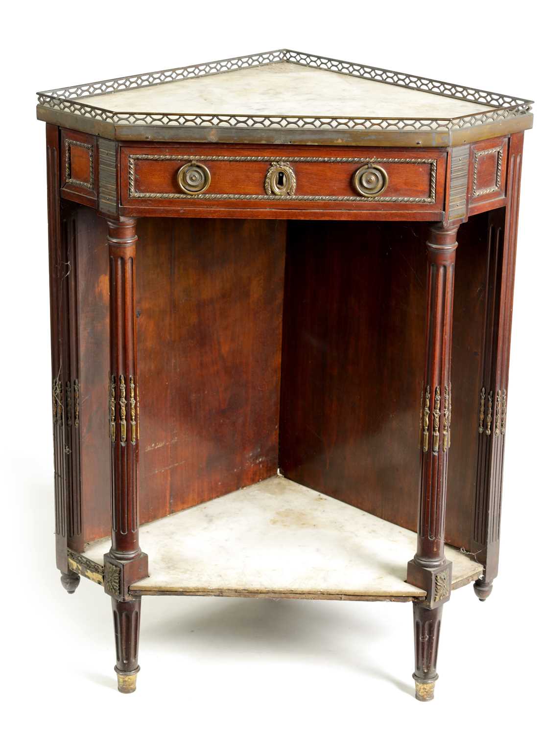 AN EARLY 19TH CENTURY FRENCH MAHOGANY AND WHITE MARBLE ORMOLU MOUNTED CORNER TABLE