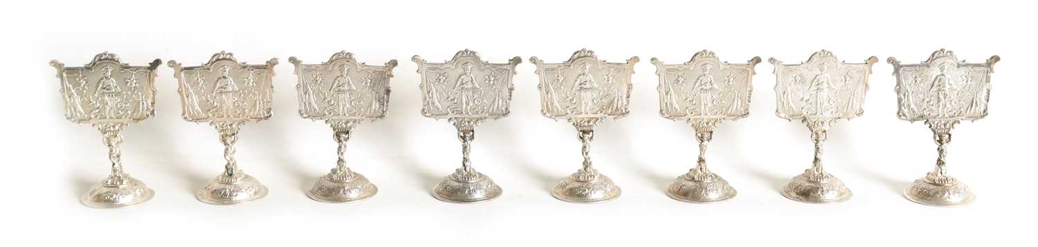 A SET OF EIGHT LATE 19TH CENTURY CONTINENTAL SILVER MENU HOLDERS