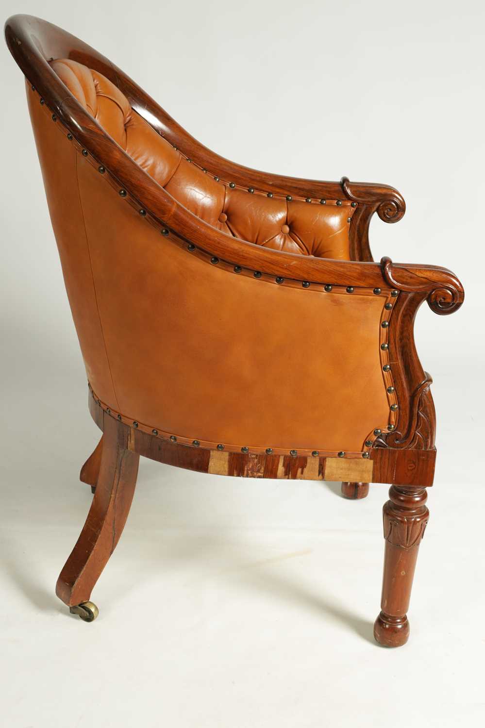 A PAIR OF REGENCY FIGURED ROSEWOOD AND TAN LEATHER BUTTON UPHOLSTERED LIBRARY CHAIRS - Image 9 of 13