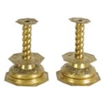 A PAIR OF 17TH CENTURY DUTCH SHEET BRASS CANDLESTICKS