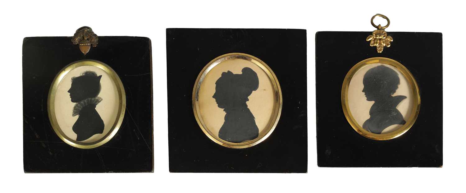 THREE EARLY/MID 19TH CENTURY SILHOUETTE BUST PORTRAITS ON CARD OF YOUNG LADIES