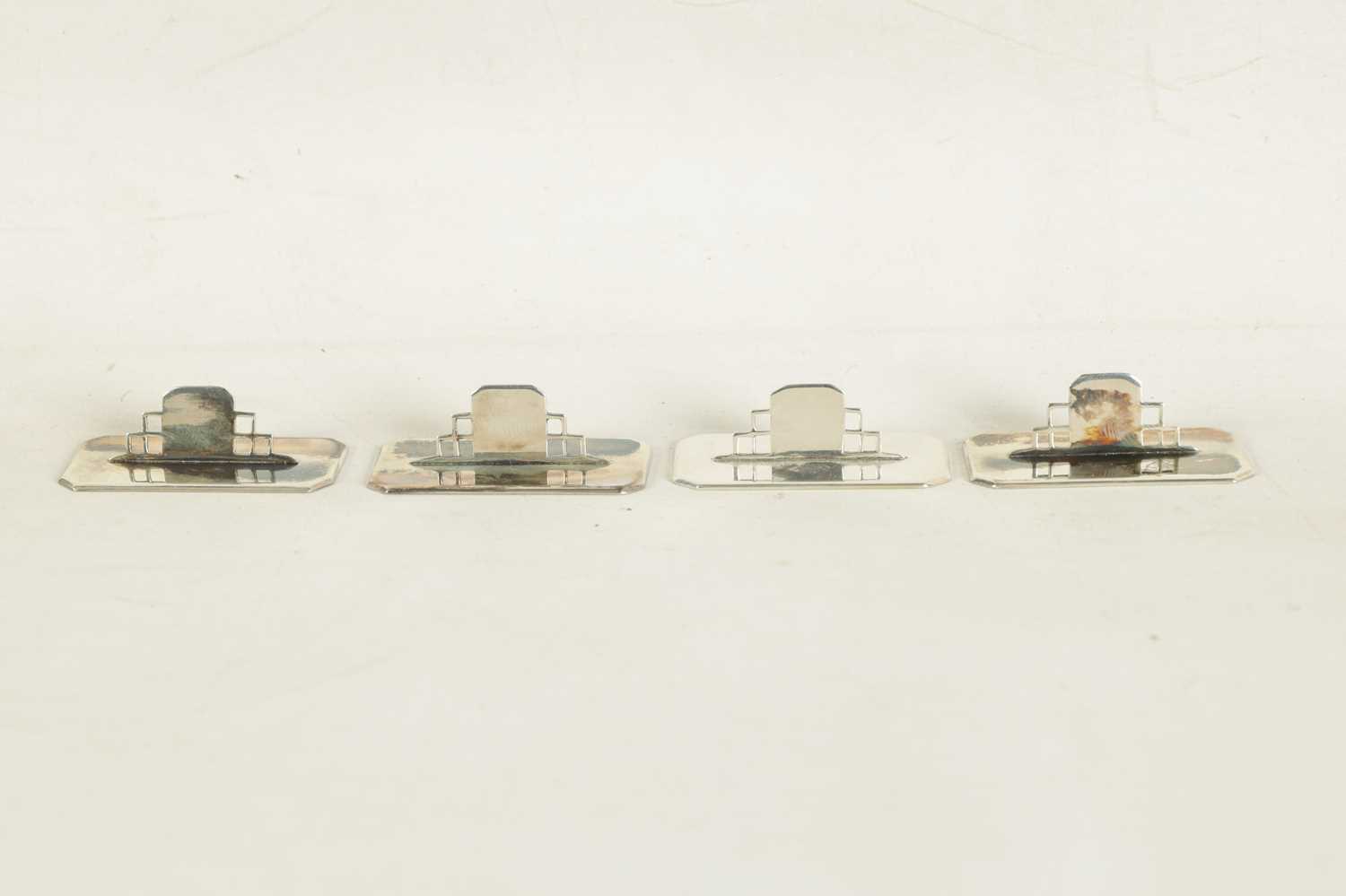 A CASED SET OF FOUR ASPREY ART DECO SILVER MENU HOLDERS - Image 4 of 14