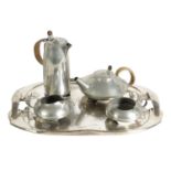 AN EARLY 20TH CENTURY ARCHIBALD KNOX FOR LIBERTY AND CO. TUDRIC PEWTER TEA SET