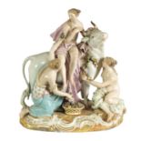 A 19TH CENTURY MEISSEN FIGURE GROUP OF A BULL WITH A SEATED LADY RIDER AND A FLOWER SELLER