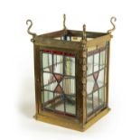 A LATE 19TH CENTURY BRASS AND STAINED GLASS HALL LANTERN
