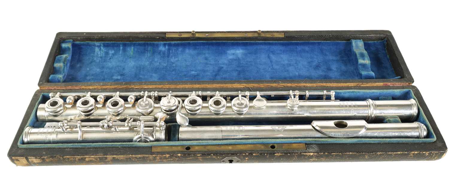 A 19TH CENTURY SOLID SILVER CONCERT FLUTE BY CLAIR GODFROY, AINE. PARIS