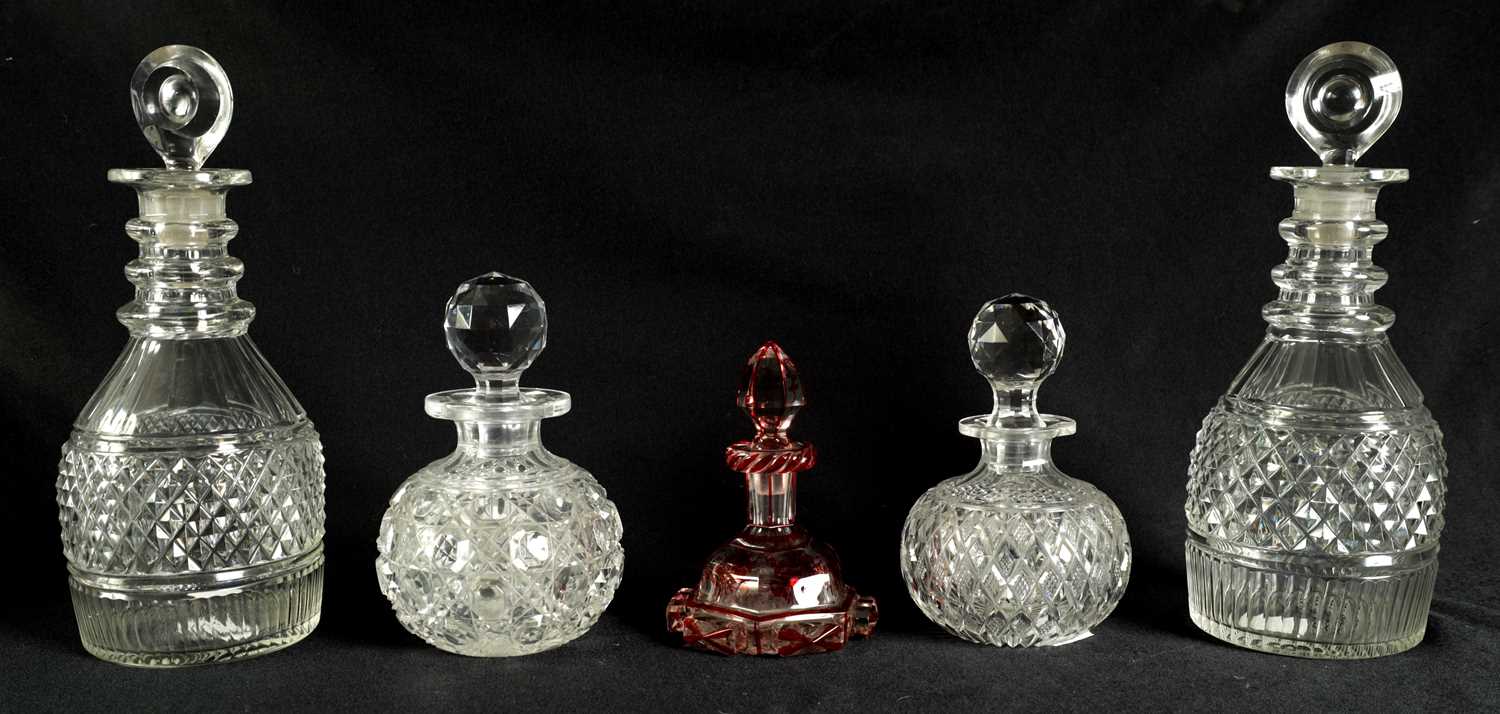 A PAIR OF 19TH CENTURY CUT GLASS DECANTERS