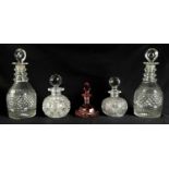 A PAIR OF 19TH CENTURY CUT GLASS DECANTERS