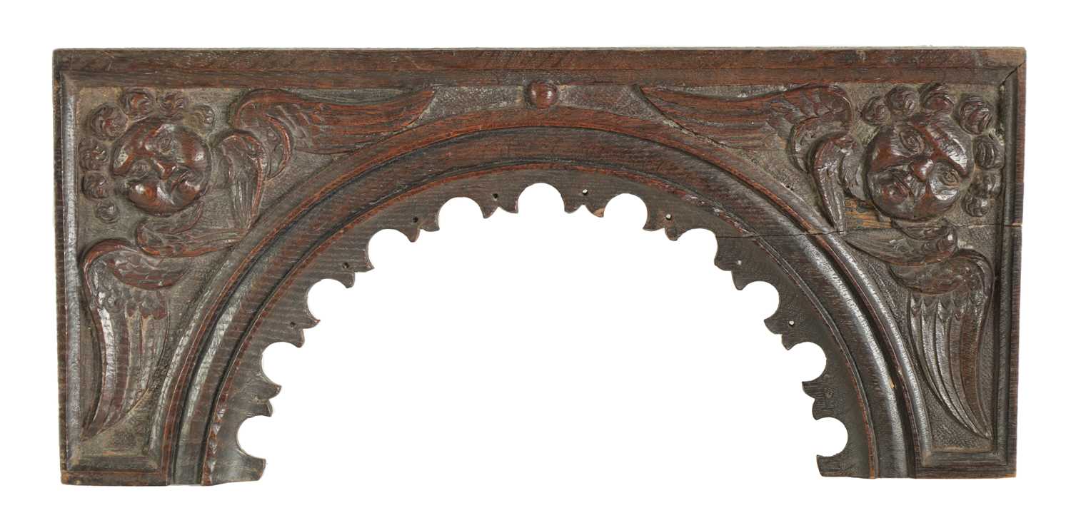 A 17TH CENTURY CARVED OAK CORNICE