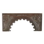 A 17TH CENTURY CARVED OAK CORNICE