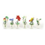 A SET OF SIX MINIATURE GLASS PLANT POT AND FLOWER SPRAY MENU HOLDERS