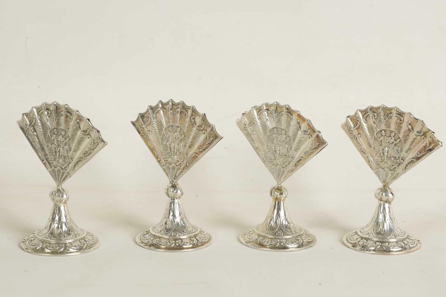 A CASED SET OF FOUR LATE VICTORIAN NOVELTY SILVER MENU HOLDERS MODELLED AS FANS - Image 8 of 11