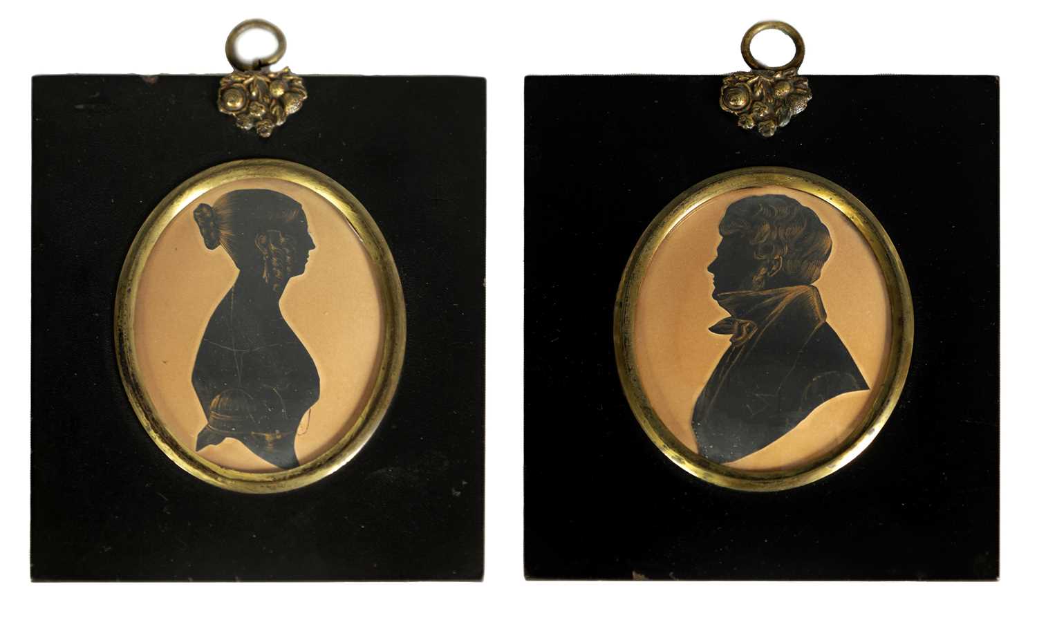 A PAIR OF 19TH CENTURY OVAL SILHOUETTES ON CARD