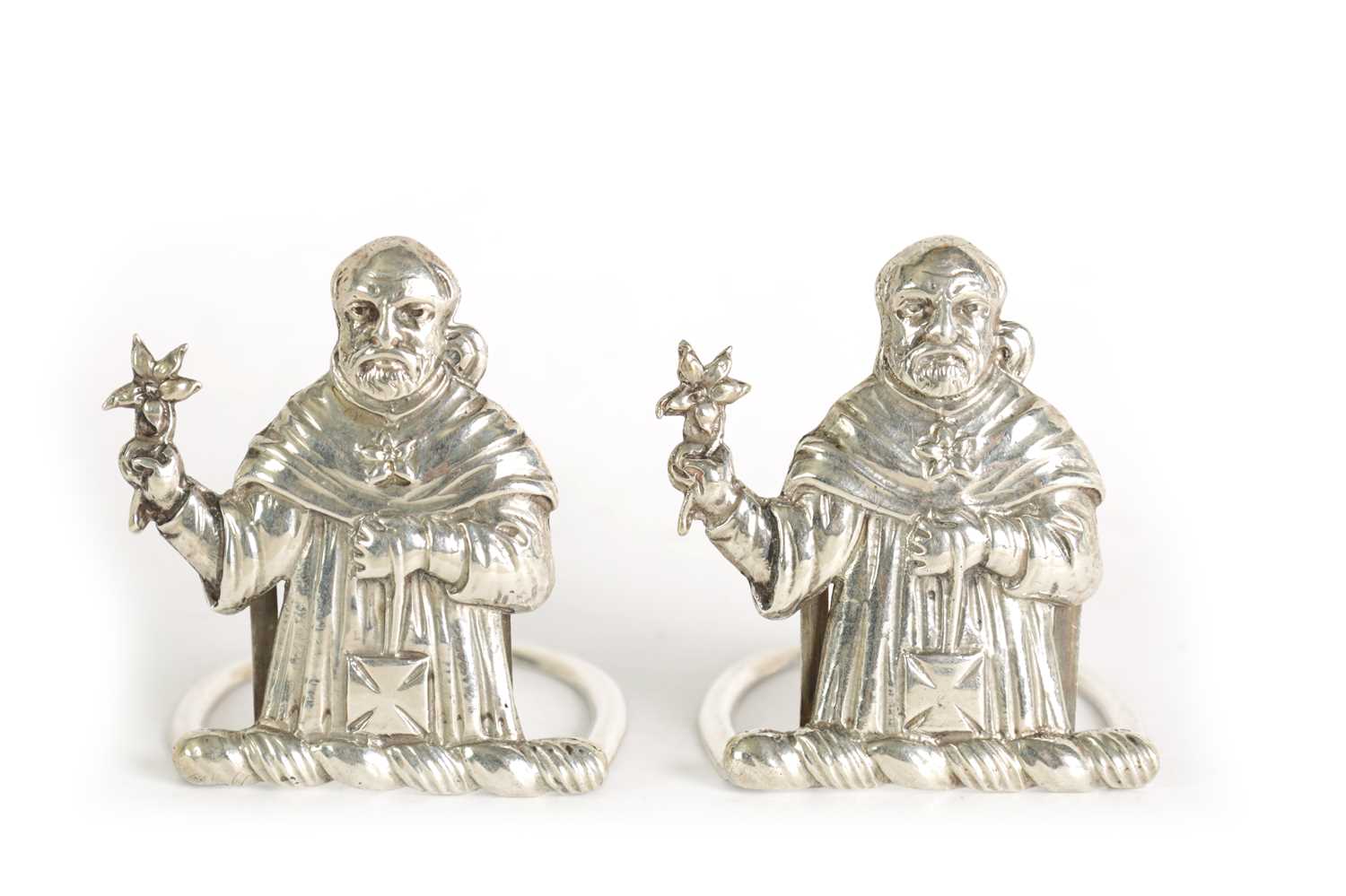 A PAIR OF SILVER FIGURAL MENU HOLDERS