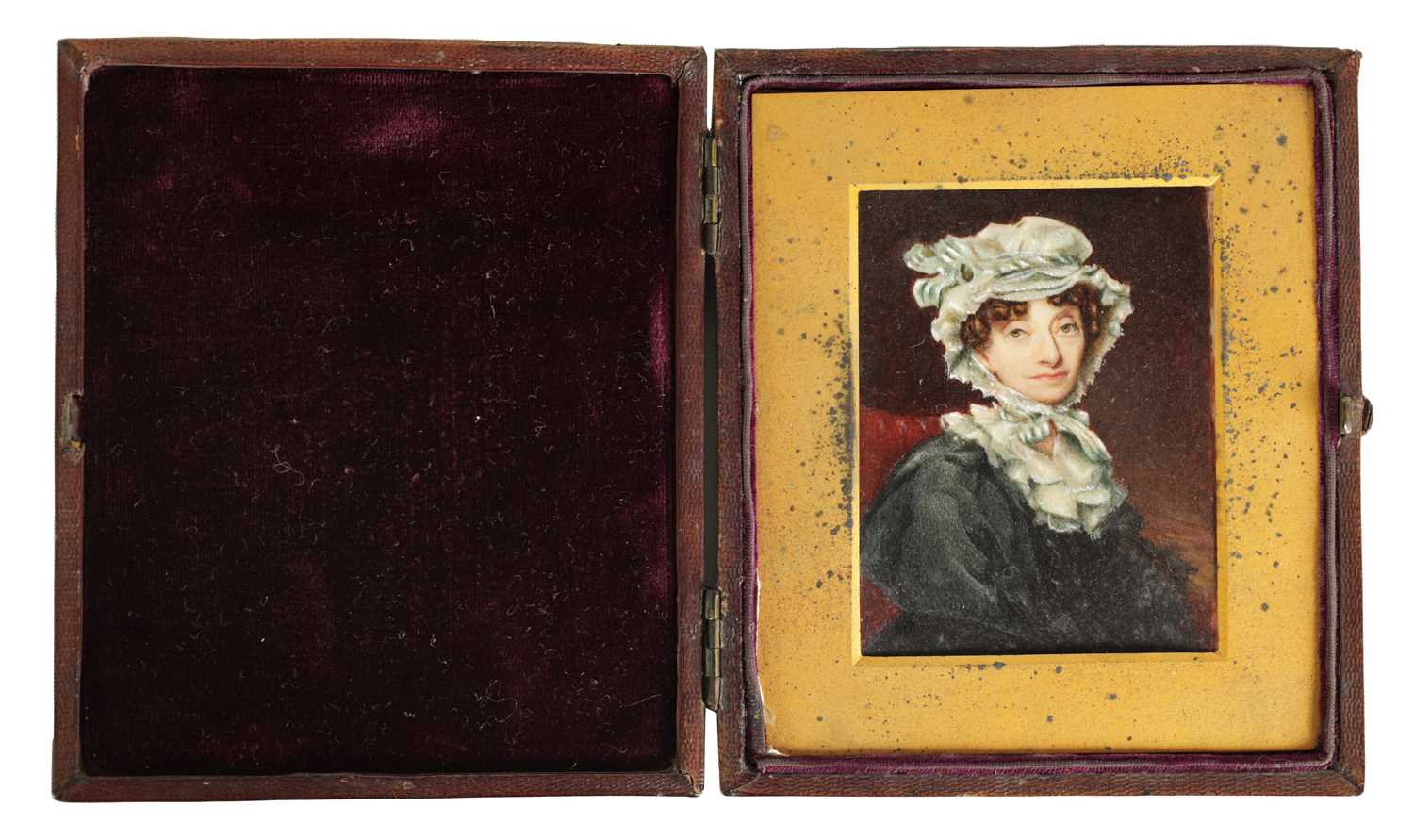 A 19TH CENTURY MINIATURE ON IVORY - HALF LENGTH PORTRAIT OF A LADY