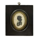 J. WATKINS-AN EARLY 19TH CENTURY SILHOUETTE BUST PORTRAIT OF A YOUNG MAN ON CARD